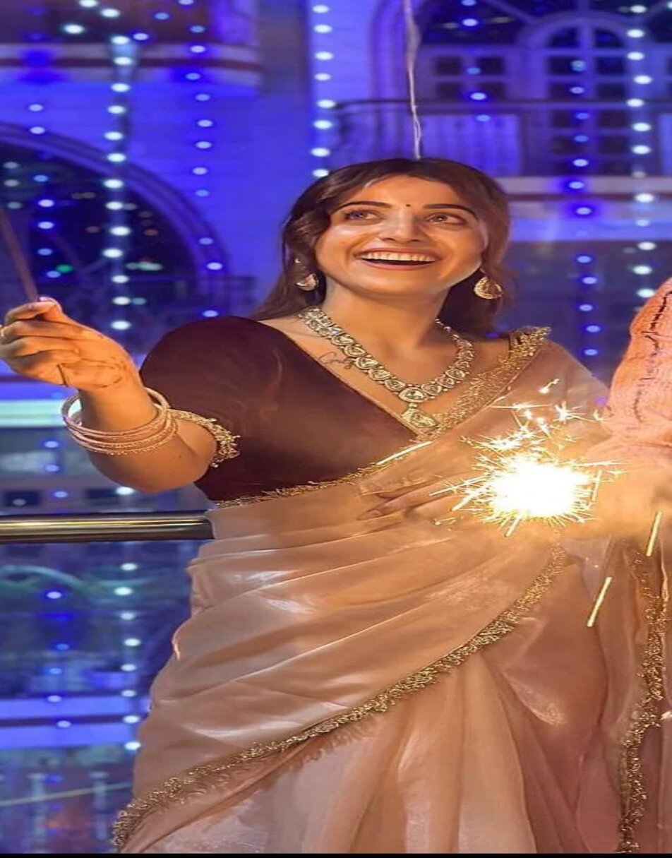 pink tissue saree with maroon velvet blouse