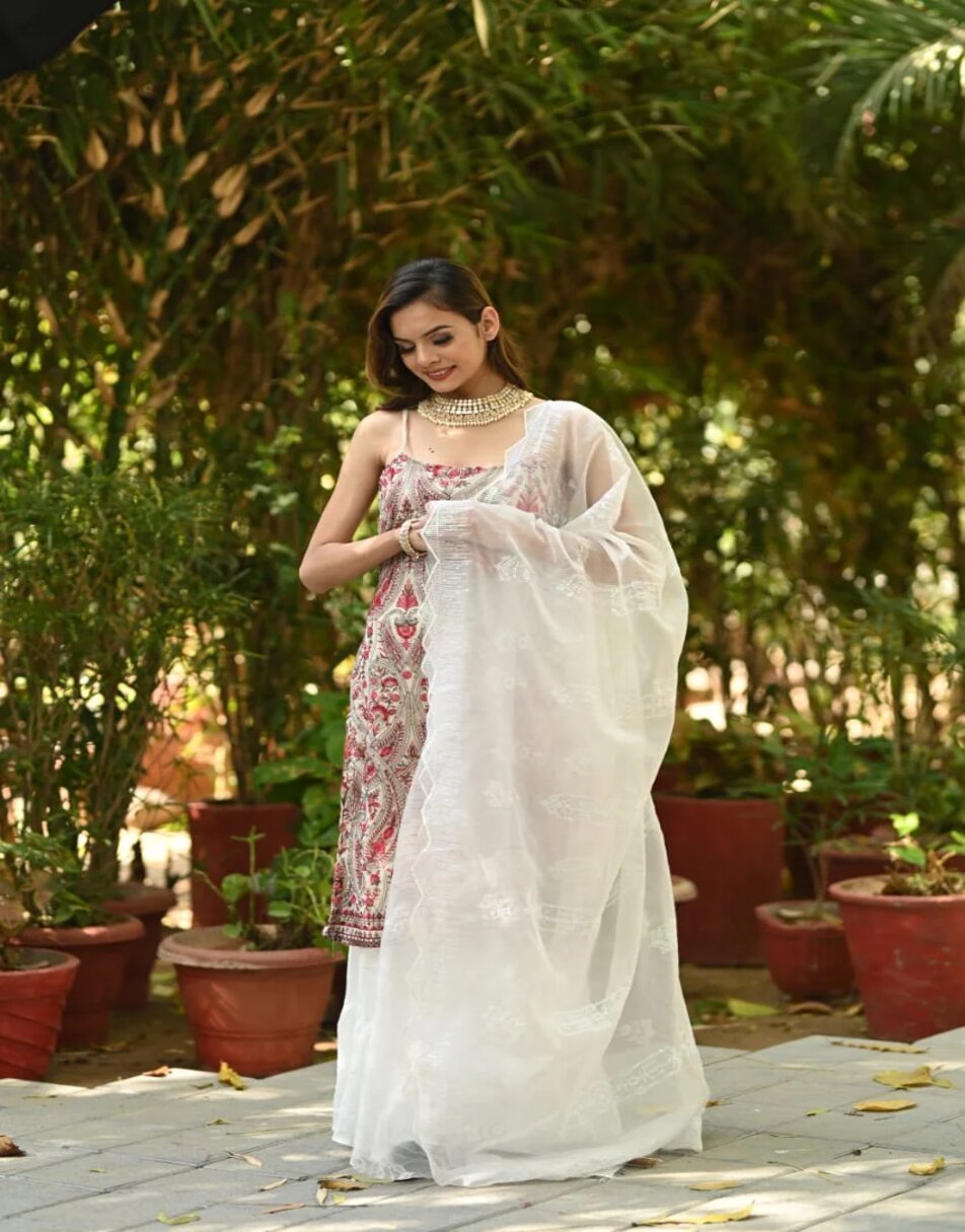 Heavily embroidered kurta with three layer sharara