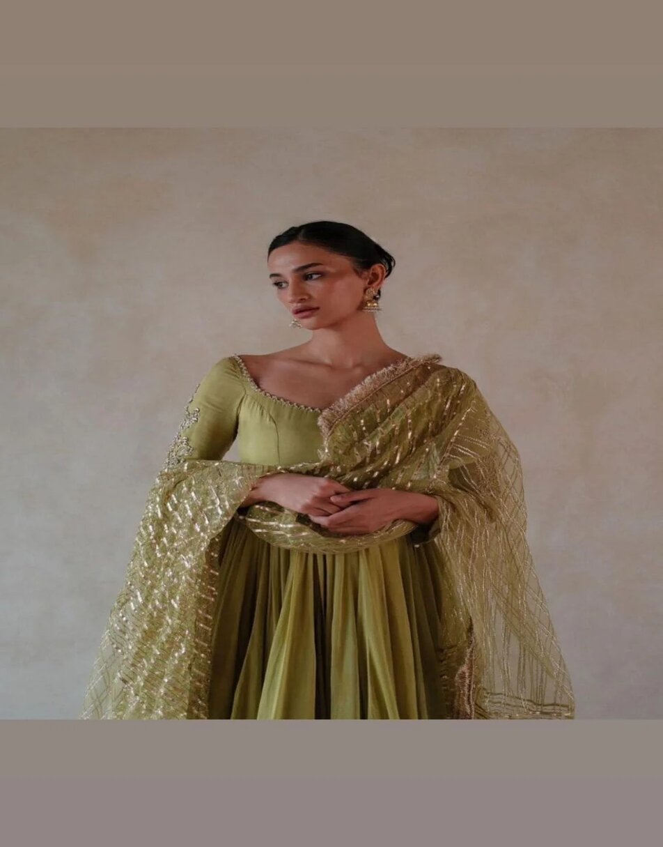 Green uppada silk anarkali with hand embroidered sleeves