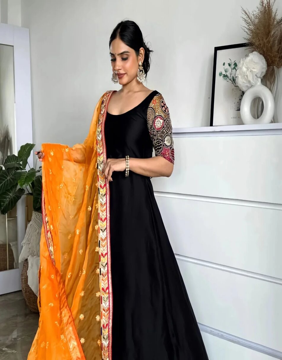 Black Anarkali With Embroidered Sleeves And Yellow Heavy Work Duppatta