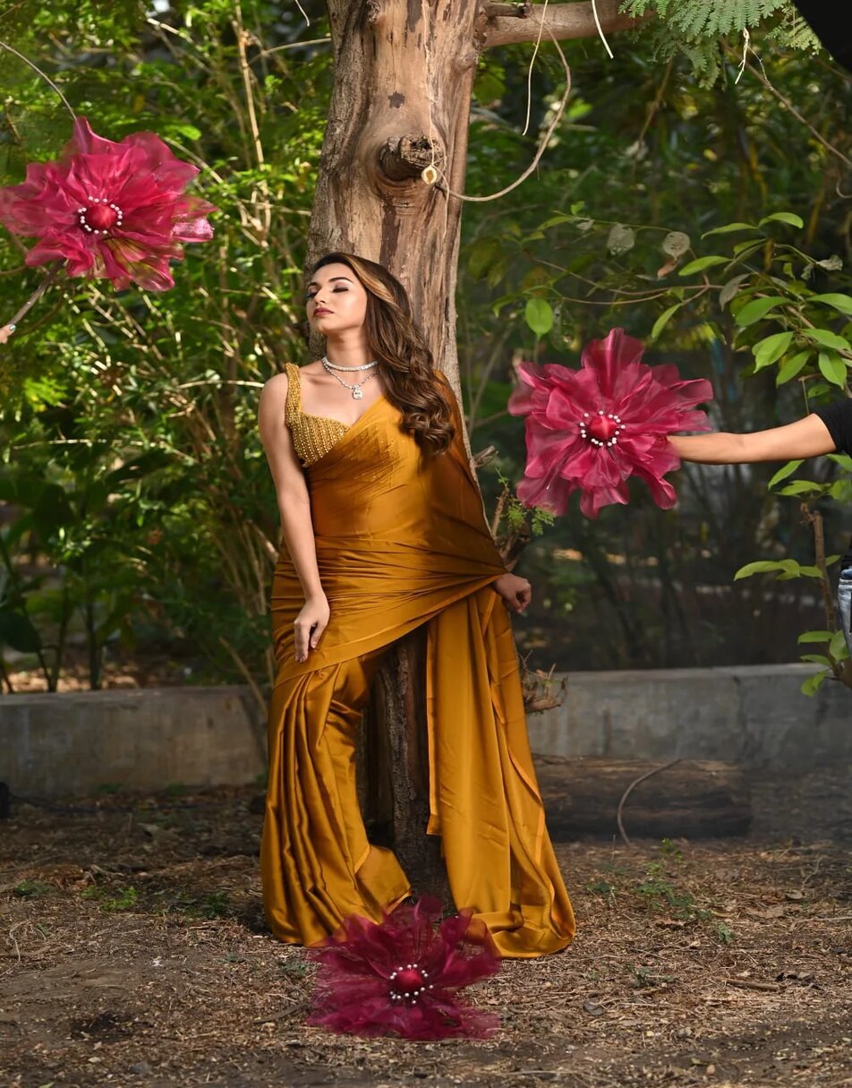 Mustard yellow laser georgette saree with embroidered blouse