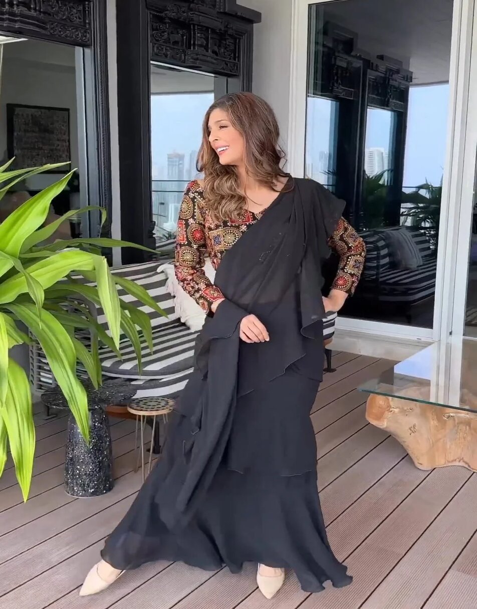 Black Ruffle Saree With Embroidered Blouse
