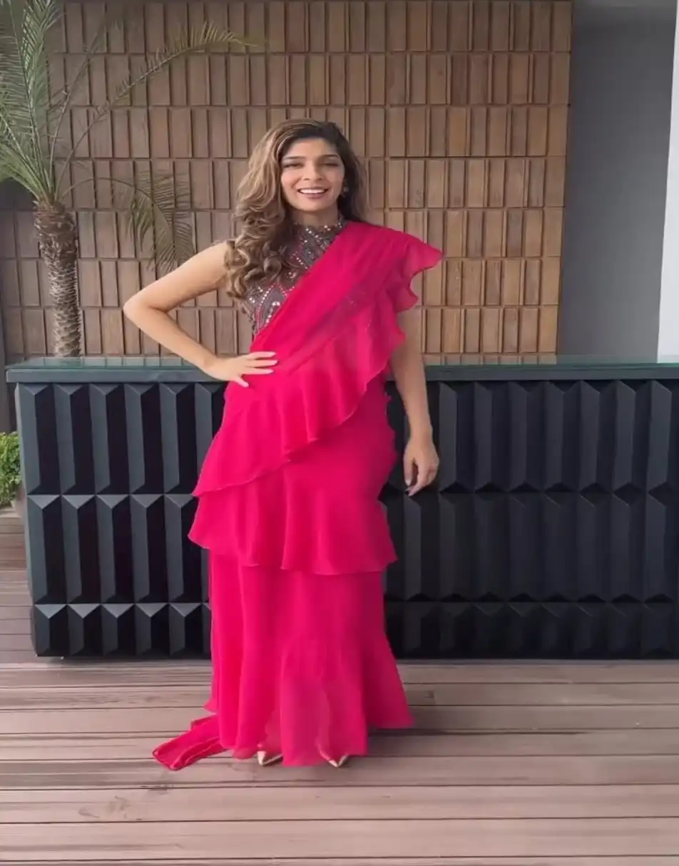 Pink Ruffle Saree With Halter Neck Blouse