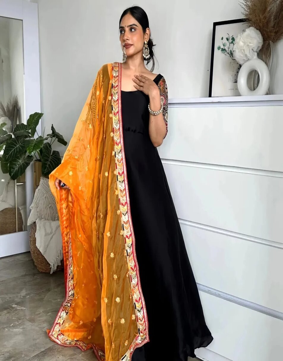 Black Anarkali With Embroidered Sleeves And Yellow Heavy Work Duppatta