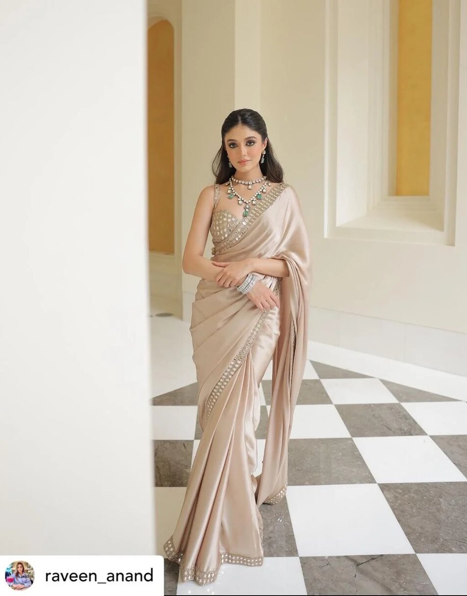 Beige modal satin saree with hand embroidered blouse